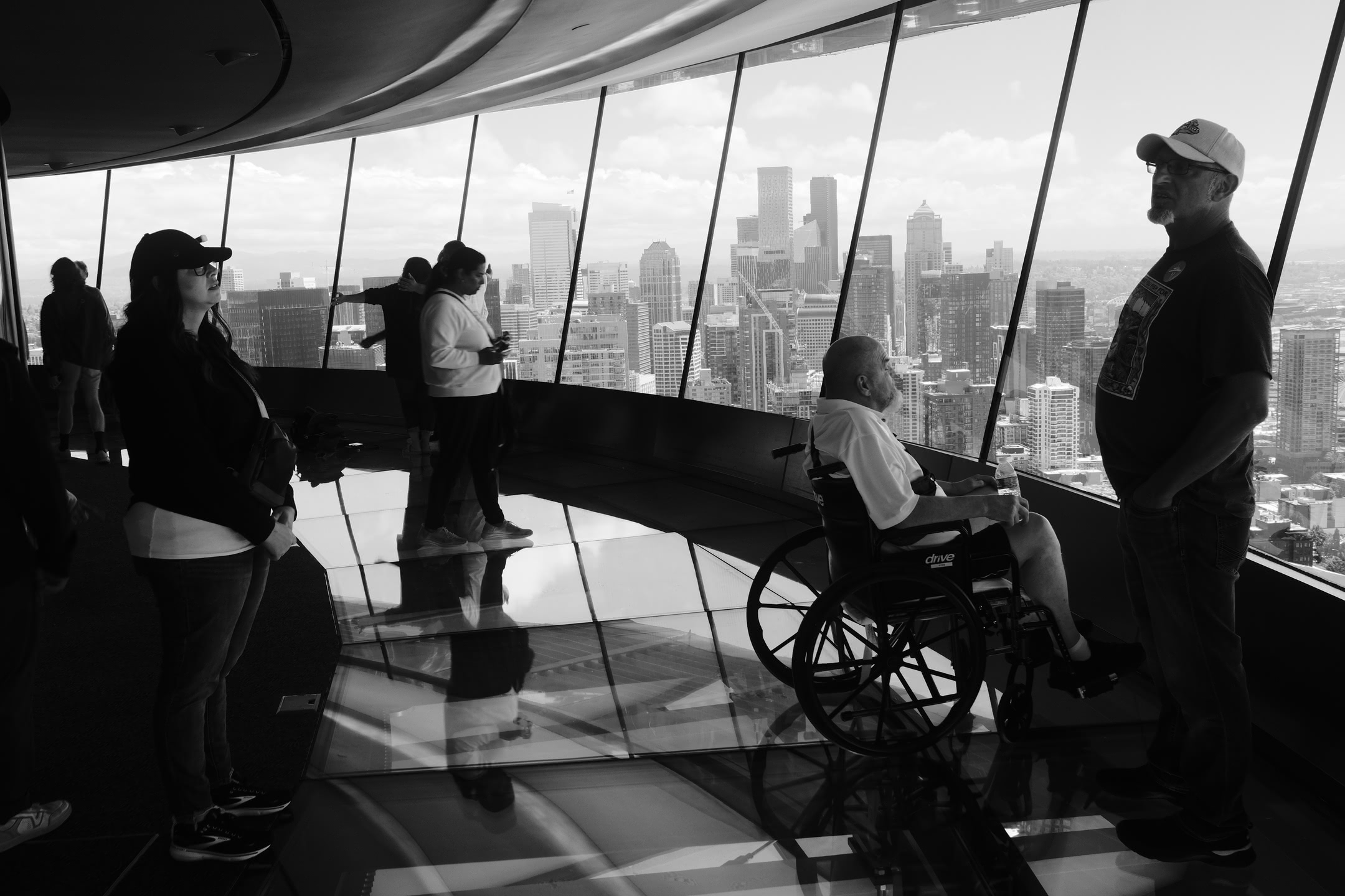 Visitors taking in the sights from atop the Space Needle.